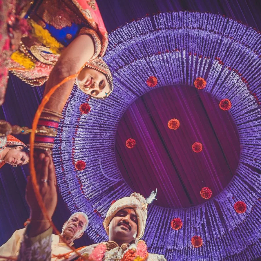 Garba dancers photographed from overhead during a wedding celebration in Gujarat