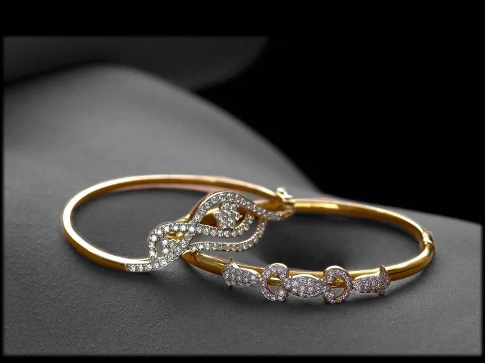 Gold and diamond bangles photographed for a jewellery catalogue