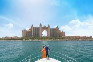 Pre-wedding portrait of a couple on a boat off the coast of Dubai