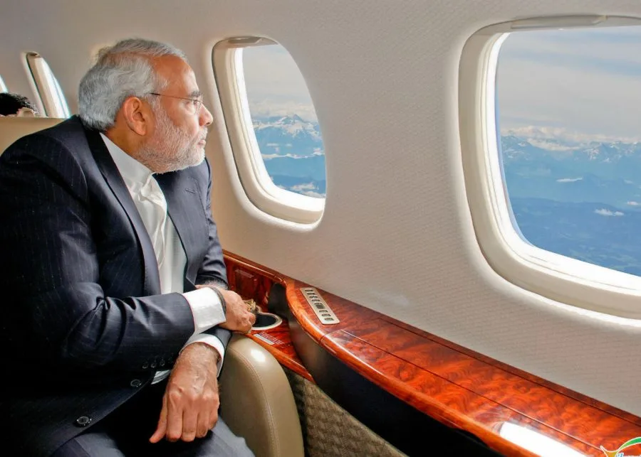 Prime Minister Shri Narendra Modi photographed aboard an aircraft on an official visit